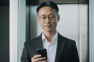 Confident Businessman Using in Office Environment photo