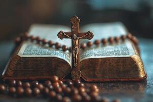 A wooden rosary and crucifix resting on an open Bible in a softly lit setting, symbolizing faith and spirituality during quiet reflection photo