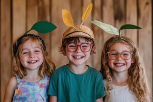 Three cheerful children wearing playful plant hats pose against a rustic wooden backdrop, showcasing creativity and joy in a fun setting photo