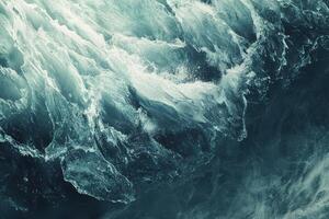 Ocean waves crashing and creating foamy patterns in turbulent sea photo