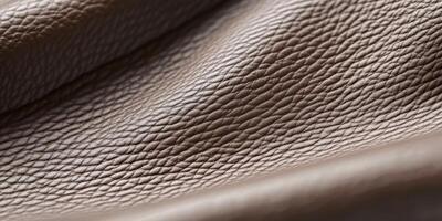 Close-up texture of brown leather material ideal for design and fashion projects photo
