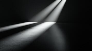 Dramatic light beams creating shadows on a dark surface with texture photo