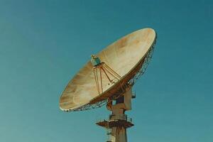 Large satellite dish exploring the universe on a clear day photo