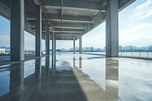 Empty parking garage structure overlooking cityscape and river photo