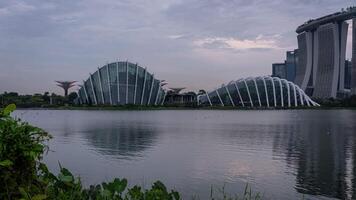 Day to night time lapse from Singapore with the Flower Dome and Cloud Forest at Gardens By The Bay video