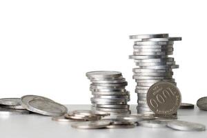 Stack of coins on the table for finance element photo