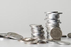 Coins scattered on the table for copy space photo