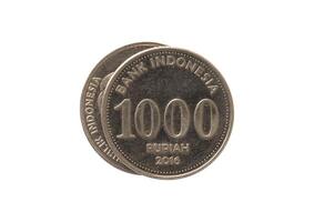 Indonesian coins isolated on white photo