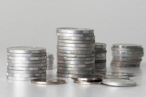 Stack of coins on the table backdrop photo