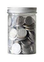 Saving money in jar isolated photo