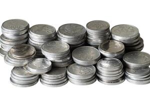 Stack of many coin isolated photo