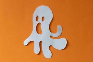 Ghost in paper cut out photo