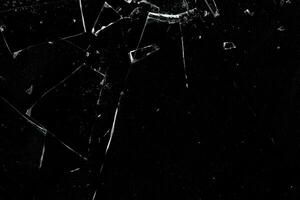Hole broken glass with crack and particle texture photo