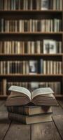 Books on wooden table and bookshelf background. Education concept. photo