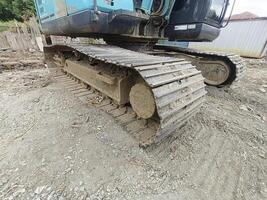 excavator working at the construction site photo
