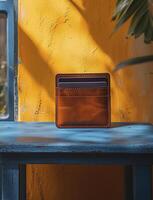 leather wallet on outdoor blue table photo