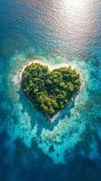 Heart-shaped tropical island surrounded by turquoise water, aerial view. romantic getaway and nature concept photo