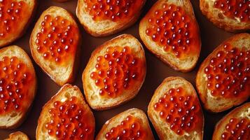 Toasted bread with red caviar arranged in a pattern, gourmet appetizer. Luxury dining and culinary concept photo