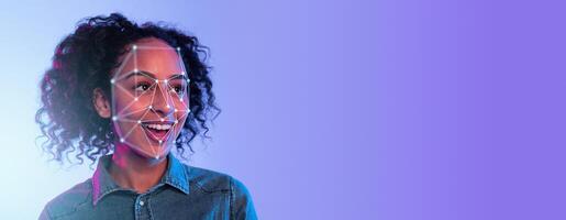 This picture showcases a person smiling while facial recognition technology is applied on their face. The futuristic background emphasizes advancements in identification methods. photo