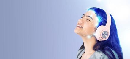 A young woman enjoys music while using advanced face recognition technology. Her expression shows excitement and engagement, highlighting the fusion of technology and modern lifestyle. photo