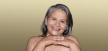 A woman experiences a tranquil skin care routine, showcasing her beauty and well-being. She smiles contentedly while nurturing her skin in a serene, minimalist setting with empty space. photo