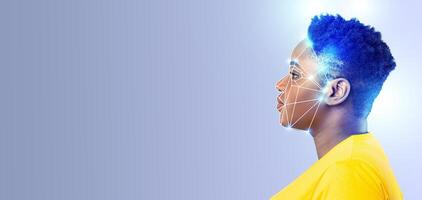 A profile view of a person with a digital overlay illustrating face recognition technology. Features bright colors that emphasize modern, advanced identification processes in an empty background. photo