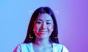 A woman smiles as facial recognition technology maps her features against a vibrant background. The process highlights the intersection of technology and human expression in modern identification. photo