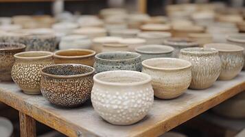 A table full of different types of pottery photo