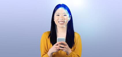 A woman smiles while using her smartphone with facial recognition technology. The background is a clean, empty space, highlighting the innovative aspects of modern identification methods. photo