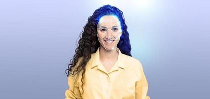 Portrait of a cheerful individual with curly hair, demonstrating modern facial recognition technology on a plain background. The scene highlights digital advancements in identity verification. photo