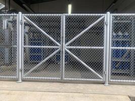 Gate with warning sign, secured area photo