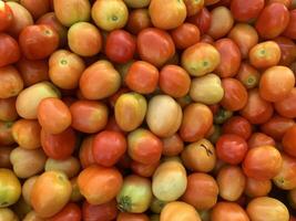 An Abundance of Vibrant Cherry Tomatoes in a Variety of Colors photo