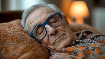 elderly man sleeps soundly in cozy bed wearing blue sleep mask. warm earth toned bedding and soft lighting create serene atmosphere conducive rest photo