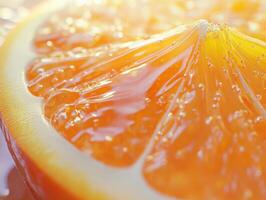 Juicy orange slice with glistening droplets reflecting soft light photo