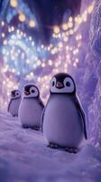 Cute penguins walking in snow with festive lights in background photo