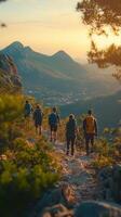 Hikers on trail at sunset with stunning mountain views, adventure and exploration, photo