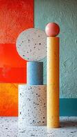 Geometric forms and colorful textures with a sphere on top, photo
