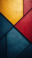 Abstract geometric shapes in red, yellow and blue with textured surface photo
