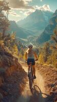 Mountain Biker Trails through Scenic Valley, Back view of cyclist, photo