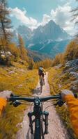 Mountain Biking Adventure on Trail with Dramatic Peaks view, POV cycling, photo