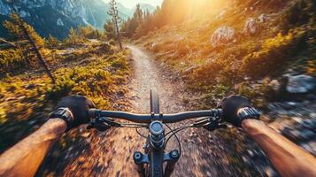 Mountain biking adventure on scenic trail, POV action shot at sunset. photo