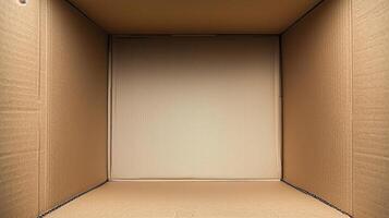 An open cardboard box with vertical deep walls viewed from the top. photo