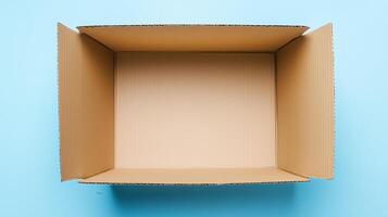 open cardboard box on blue background photo