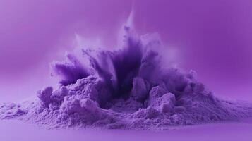 a purple powder is being blown up into the air photo