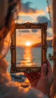 Framing the Golden Hour A Glimpse of Sunset Through an Ornate Vintage Frame photo