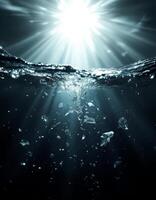 Sunlight Piercing Through the Water,s Surface Illuminating the Depths Below photo