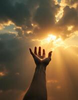 Reaching for the divine light a symbolic gesture of hope and spiritual connection to the universe photo
