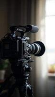 Professional Camcorder Set Up Ready for Filming Indoors With Natural Light photo
