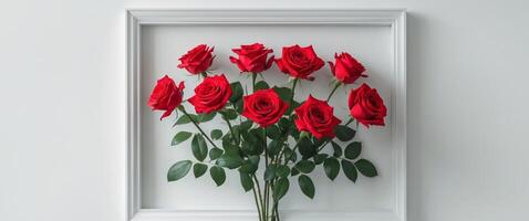 A bunch of red roses frames border for text and design with copy space. photo