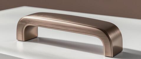 Decorative Mocha Mousse desk drawer handle showcasing ergonomic design and brushed finish. photo